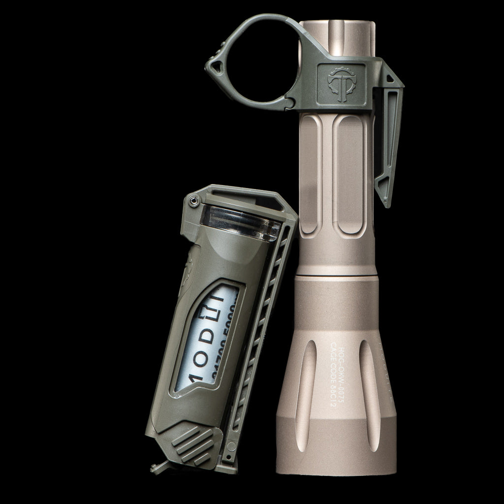 Tactical flashlight with green and tan finish, featuring a rugged design, integrated clip, and digital display for wildern...