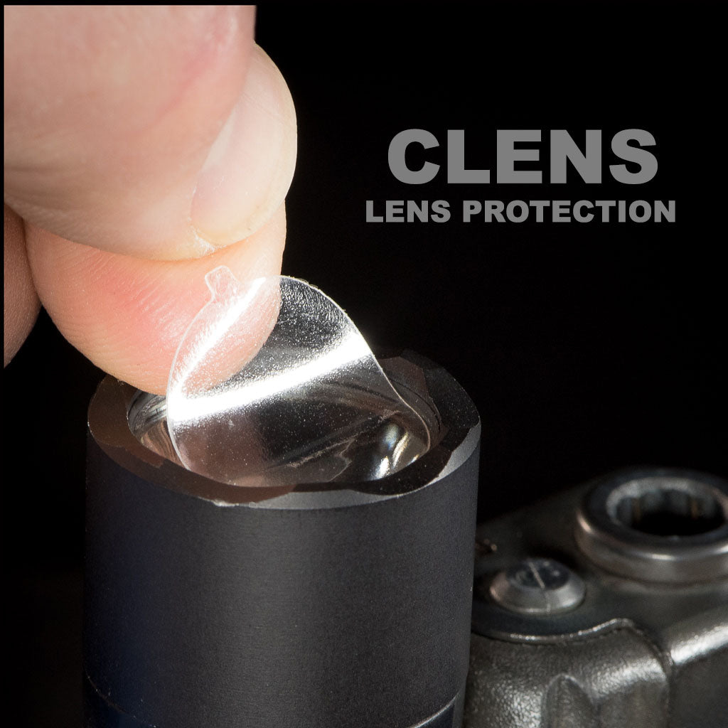 CLENS lens protection being applied to a flashlight, showcasing its clear, durable design for tactical use and tab for application and removal.