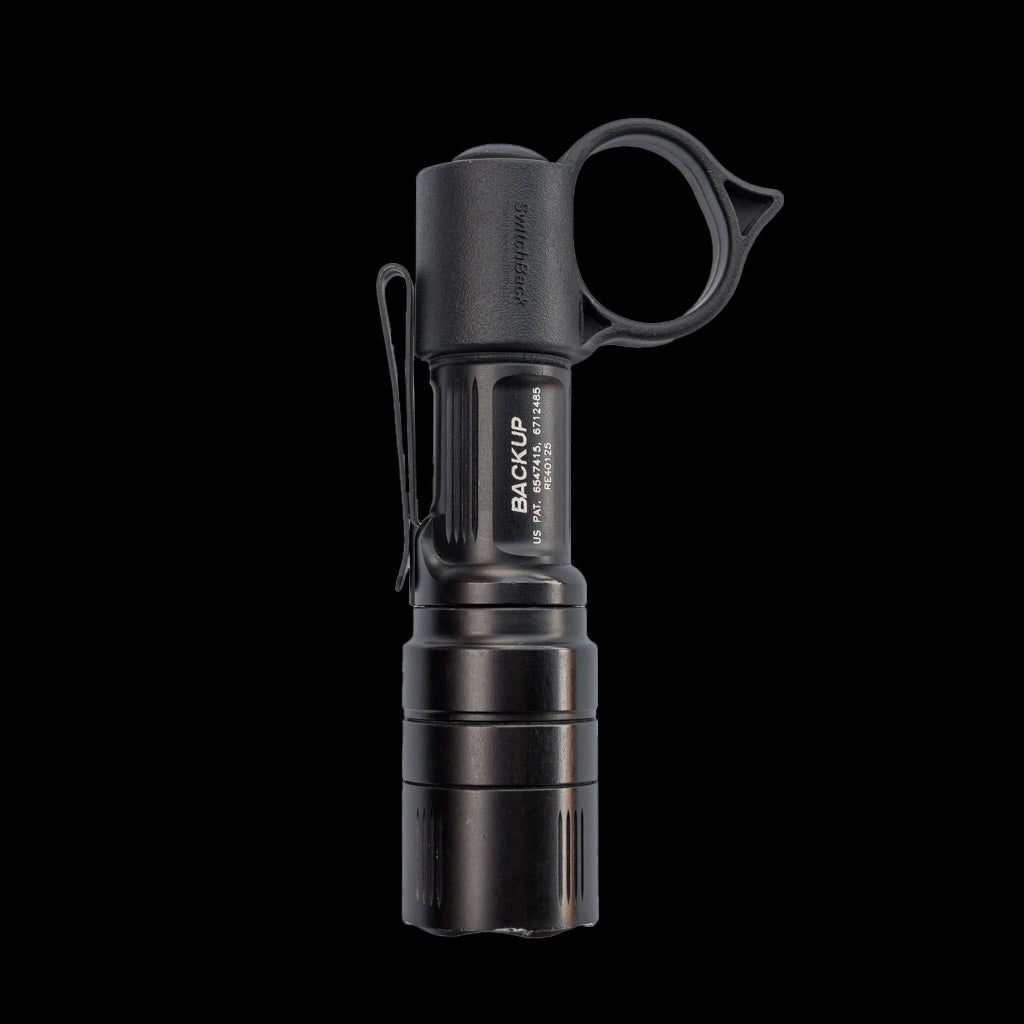 SwitchBack S SureFire EDC flashlight ring attachment for enhanced grip and accessibility in tactical situations.