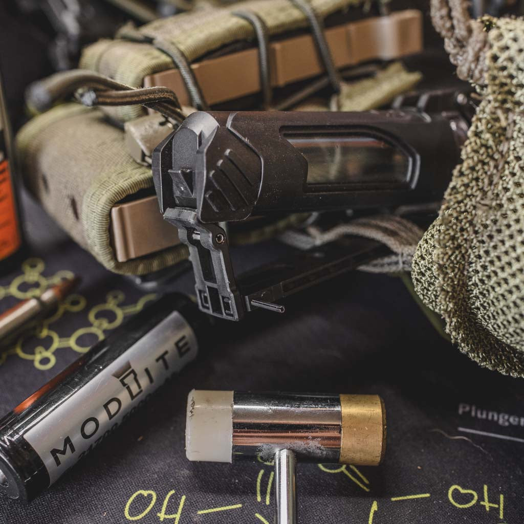 Partially opened CellVault-21 Battery Storage showing the locking features including a pin that can be removed for easier stiff MOLLE mounting.