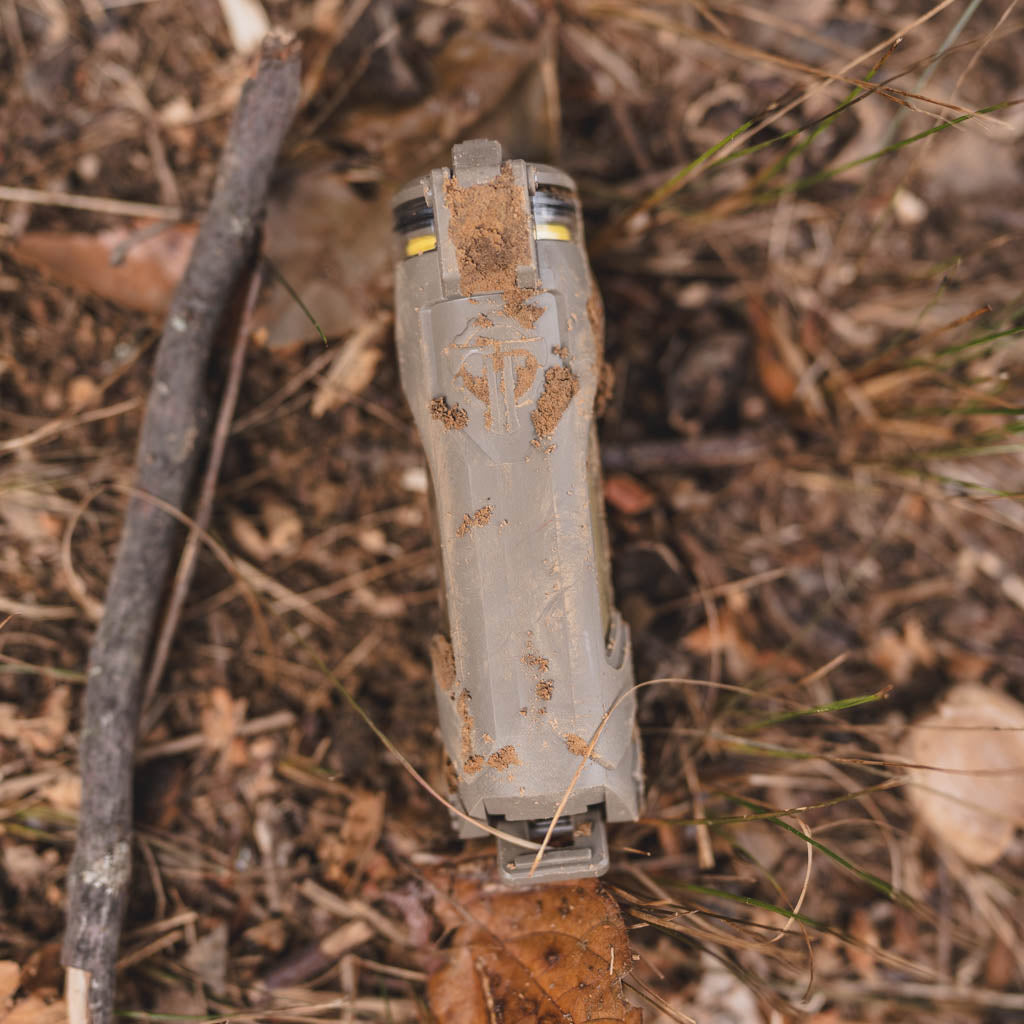 CellVaults hold up to the elements!  Dirty CellVault Battery Storage amongst dirt, leaves and twigs.