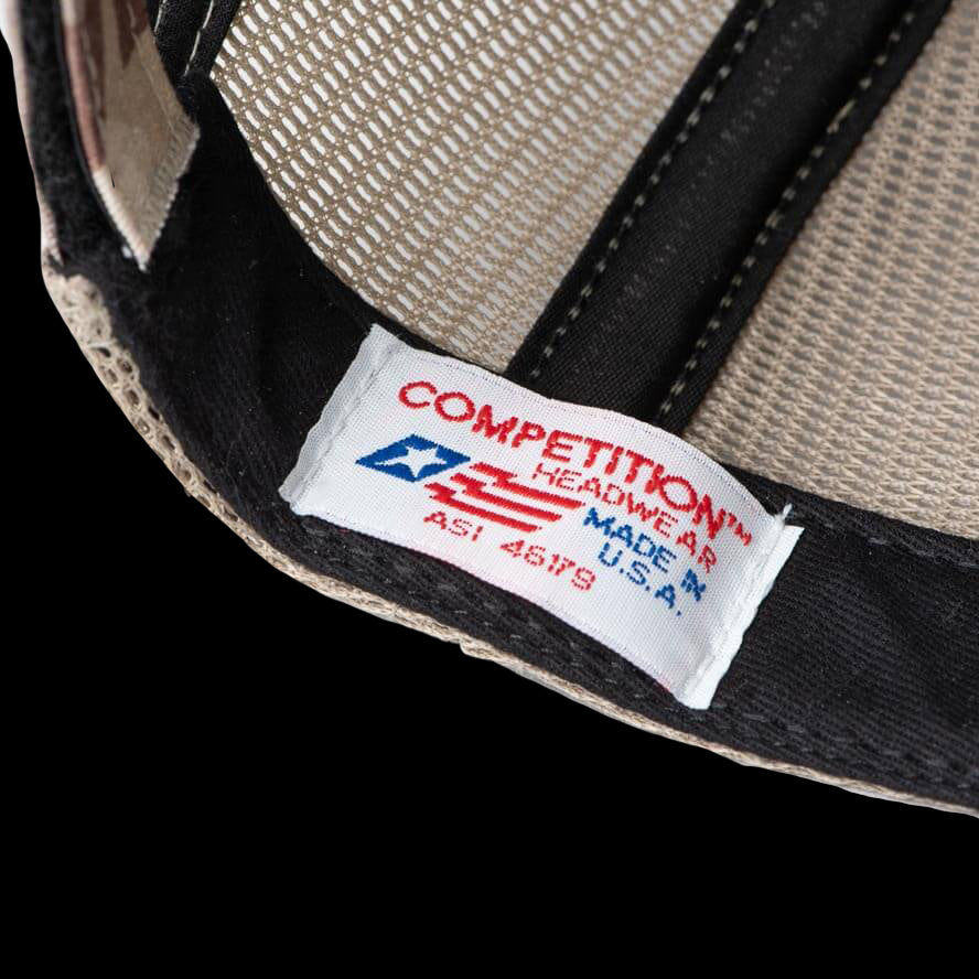 The Thyrm trucker hat featuring a breathable mesh back and adjustable Velcro closure is made in America.