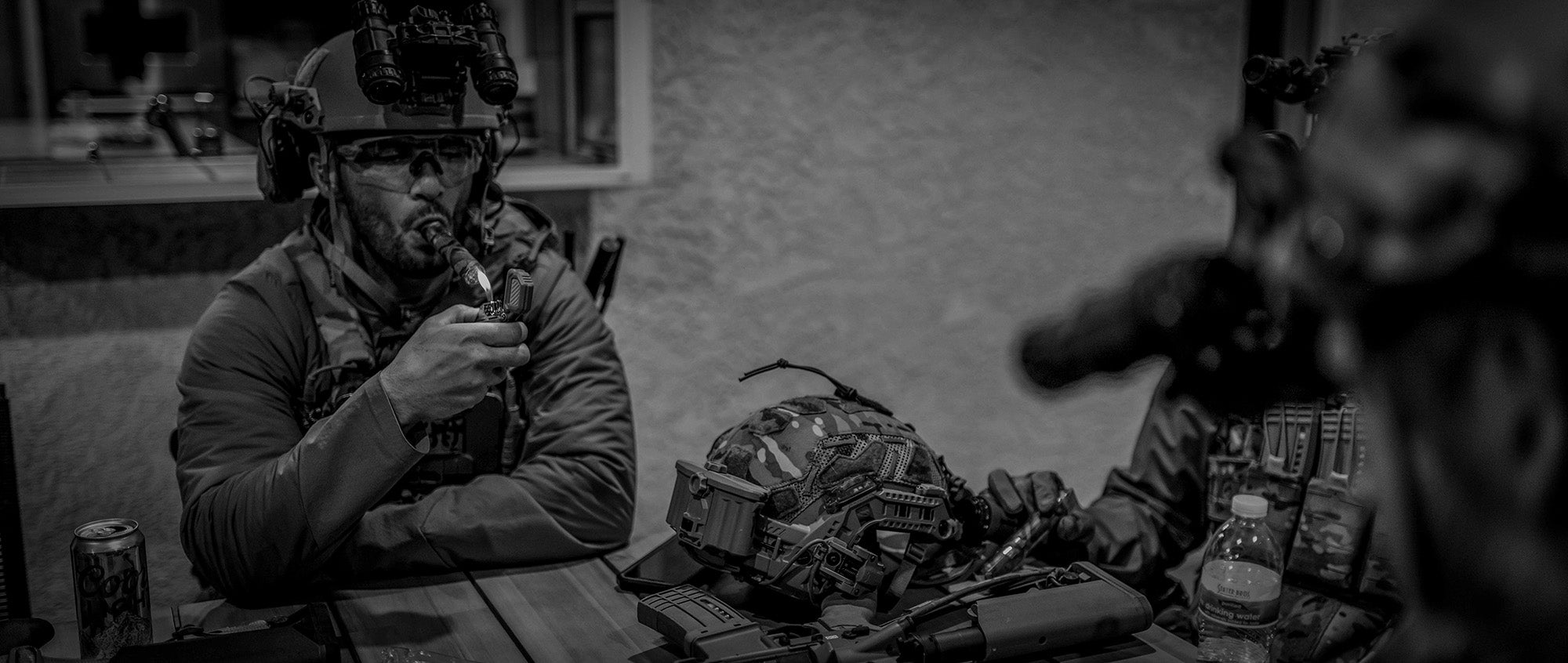 Soldiers taking a break around a table using a Thyrm PyroVault 2.0