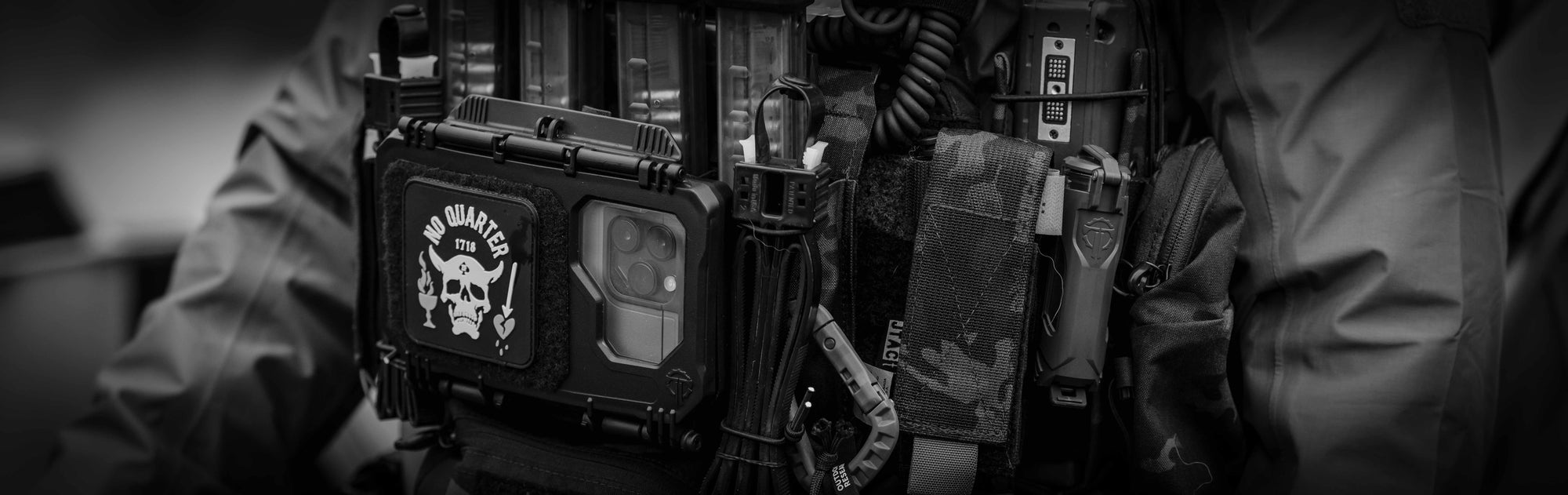 DarkVault Comms 2.0 Case with smart phone camera lenses visible, on a duty vest with a CellVault-18