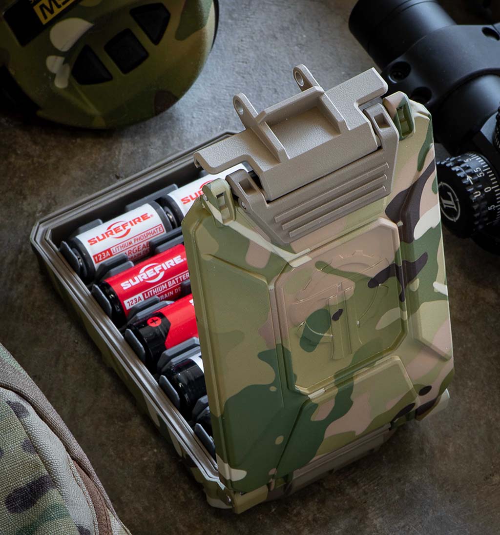 CellVault-5M opening to reveal CR123 and other batteries inside.
