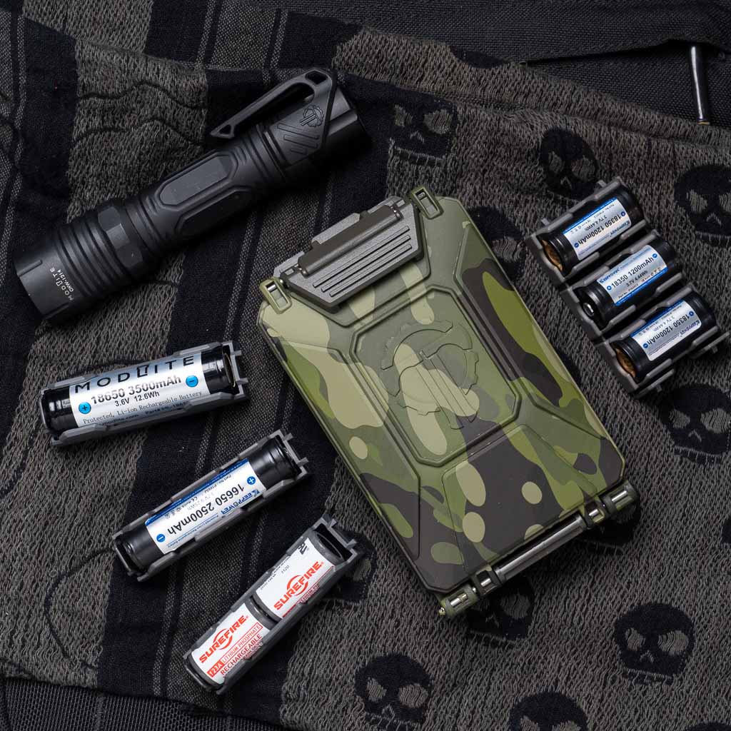 Camouflage Thyrm CellVault-5M with batteries on a tactical background