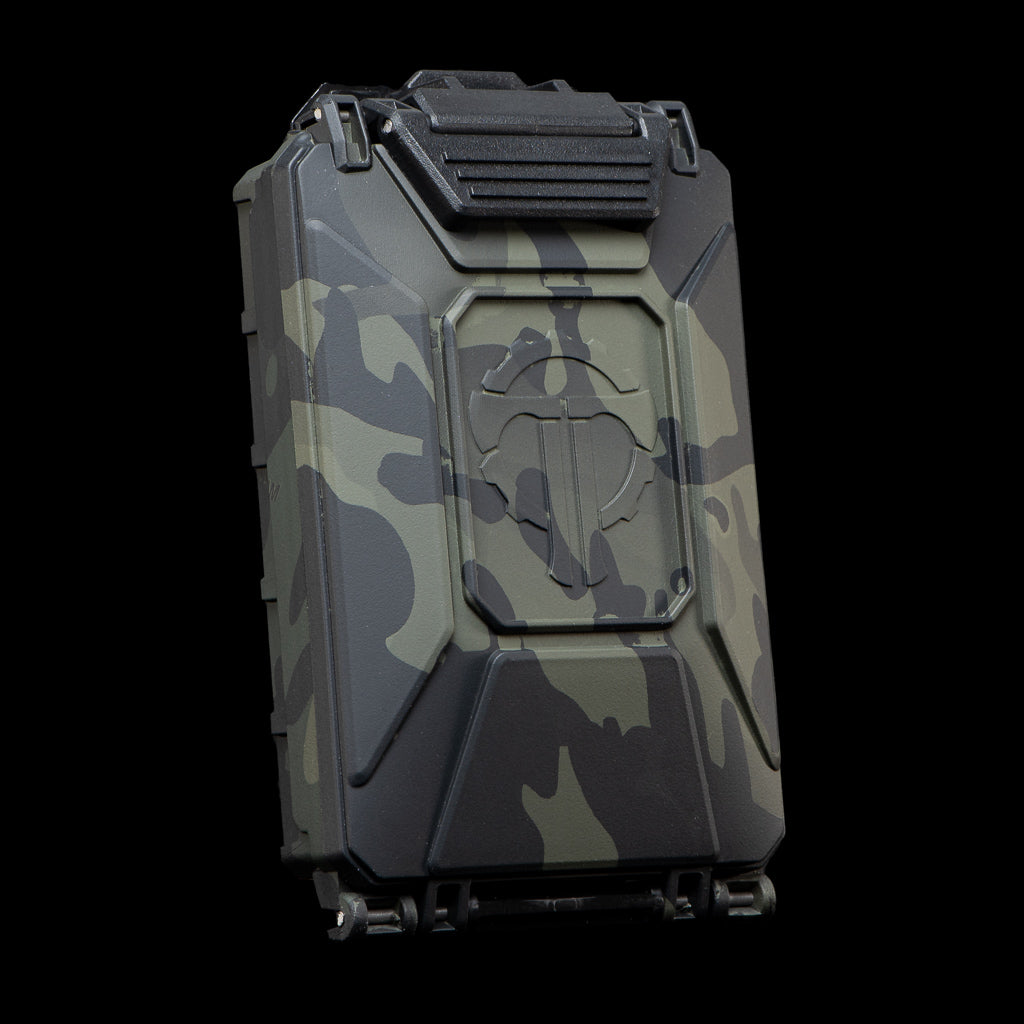 Camouflage tactical hard case with rugged design, black accents, and a gear attachment point for wilderness use.