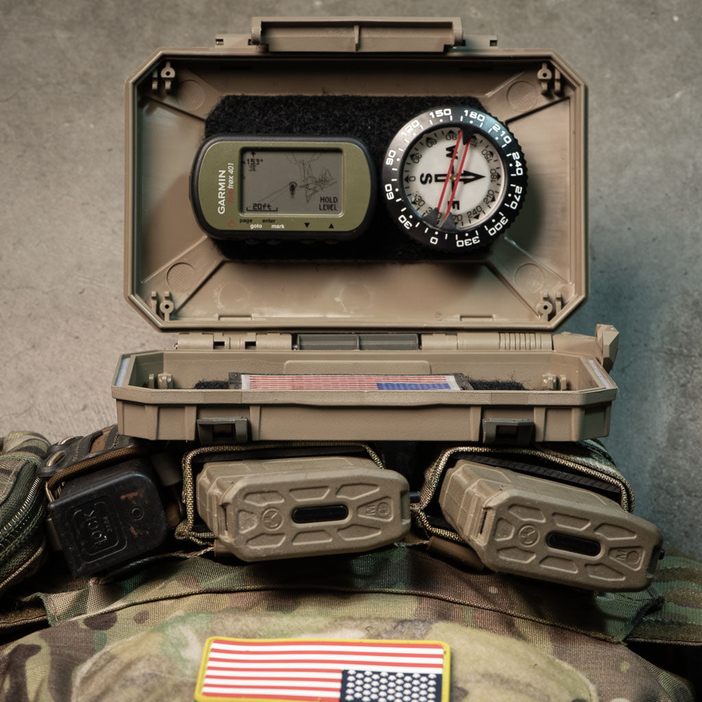 DarkVault Comms Critical Gear Case with navigation equipment Velcro mounted inside the lid.  The case can act as a Nav Board.