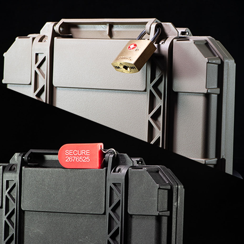 Two DarkVault Comms Critical Gear Cases with locks and security labels on a black background