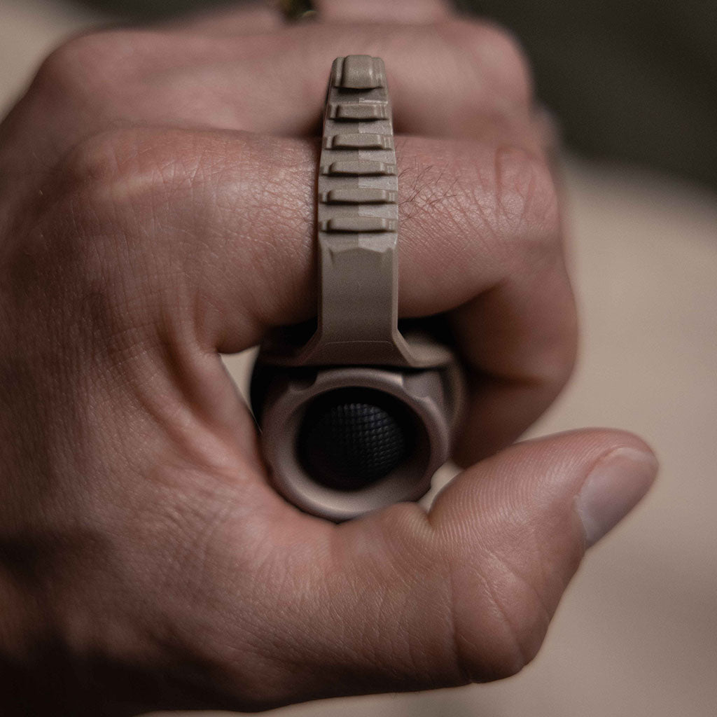 The SwitchBack 3.0 Duty Flashlight Ring has more pronounced texture on the finger ring