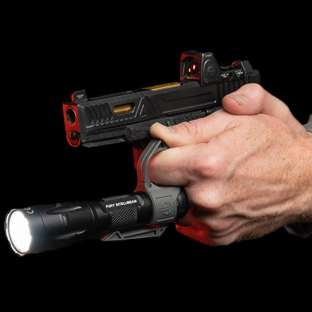 SwitchBack 2.0 Large Flashlight Ring with Pocket Clip attached to a firearm, enhancing grip and flashlight accessibility.