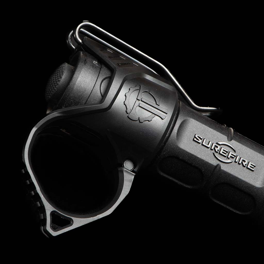 SwitchBack 3.0 Deep Carry Flashlight Ring with wire pocket clip on a SureFire light