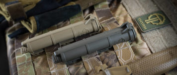 Two CellVaults mounted to MOLLE on plate carrier