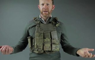 Still shot from MilSpec Monkey Video featuring chest rig carry of CellVault XL