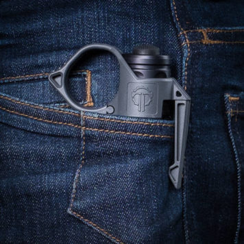 Pocket Clip holding SwitchBack flush against a denim pocket