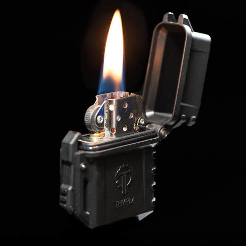 Black PyroVault with a lit classic Zippo fluid insert