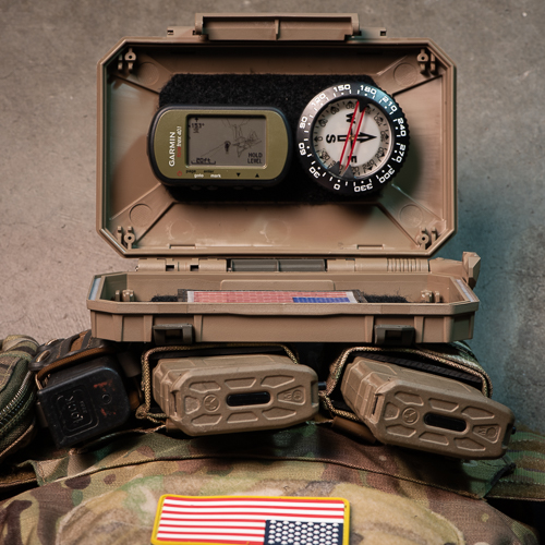 Open DarkVault Comms Critical Gear Case, showing a GPS system and analog compass