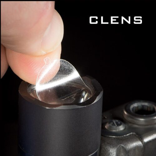 Finger manipulating a CLENS Protector on a light