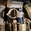 SwitchBack Large 2.0 Flashlight Ring mounted on a light in a belt