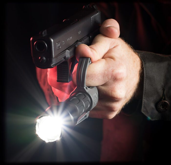 SwitchBack Technique, a two-handed gripping technique with a non-mounted flashlight