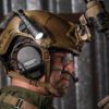Model with helmet and light pivoted down care of the VariArc Helmet Mount