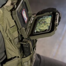 DarkVault Critical Gear Case with a patch mounted and cellphone being used for navigation