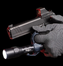 Gloved hand showing SwitchBack Technique with a SwitchBack 3.0 Duty Flashlight Ring